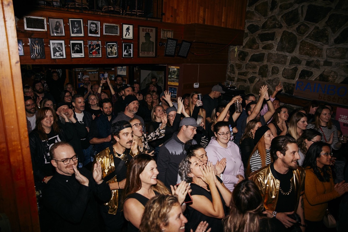 A packed, cheering crowd at the Rock-Off at The Rainbow Bistro